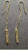 One of my yellow Gucci lariat drop earring which was really important to me emot