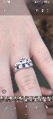 My sliver claddagh with whitr and blue gem stones.