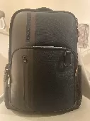 I have lost a dark green and black samsonite backpack containing an FRNC hand ba