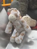 
Lost a kids soft cuddly toy giraffe (often mistaken as a cow). It’s white and b
