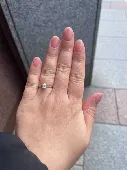 It is a platinum ring with a 0.4ct round diamond. I was travelling on the tube f