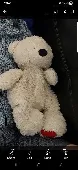 My son has Lost his very special friend. He is a white teddy bear with love hear