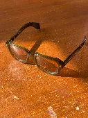 A pair of Jacques Marie Mage sunglasses
Olive colour acetate with Yellow prescri