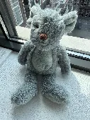Type: Stuffed animal / plush toy
Animal: Koala bear
Color: Light grey with a sli