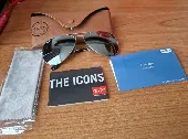 Ray Ban aviators, silver framed and with mirror black lenses.