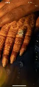 It was an oval shaped diamond ring set in white gold with a very thin pave band.