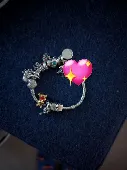 I found a pandora charm bracelet with lots of charms on it on Monday 16th in Ban