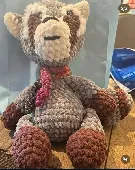 I lost a crochet raccoon shit a necklace with his name Ralph 