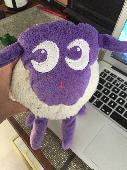 Well loved ‘Ewan the sheep’ . White (now grey!) sheep soft toy with purple legs 