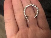 Lost a silver small hoop earring near Cannon Street underground station Tuesday 