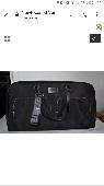 lost my luggage bag it's a black versace fragrance bag with clothing inside must