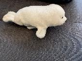 Found white seal cuddly toy in the car park at Meadowhall. Dowman soft toy brand