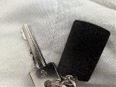 I lost a set of keys consisting of a Kia car key, black key fob and a door key o