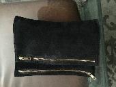 Black suede ASOS bag. Contains make-up and keys 