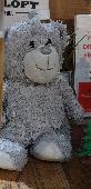 grey teddy - my son's from birth. Grain Loft in Manchester airport, it was left