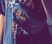 I lost my black shoulder bag with my wallet and work ID inside. It was left arou