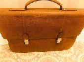 Lost tan leather briefcase around noon yesterday on Platform 2 at Blackfriars St
