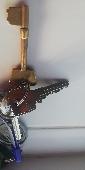 Set of keys including brass door key (see pic) and black remote alarm fob.Tesco,