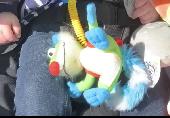 His name is treelo from bear in the big blue house. He is bright green with a re