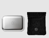 Small gold zipped bag containing Master & Dynamic charging case and a pair of mo