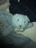 Lost : a very well loved (and worn) soft baby blanket toy. It is a baby blue col