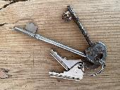 Keys are two deadlock keys in bright steel, one long one a bit shorter, two smal