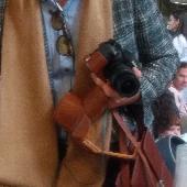Nikon camera in light brown vintage case lost in Venice. Photos from New york, m