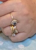 4 rings - 1 platinum and gold wedding band engraved on the inside , 1 diamond so