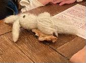 Little white knitted bunny.