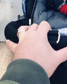 A gold wedding ring.