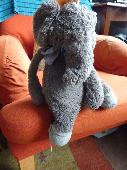 Moulin Roty Bazar Bo Elephant, grey with tuft of orange hair.