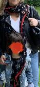 A silk black and red scarf with bugs and Beatles design