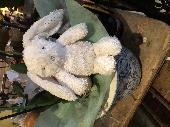 White Bunny about 25cms in height with silver polka dots in ears and a silver no