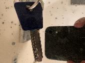 Lost single house key with Louis Vuitton key ring received as recent birthday pr