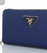 I lost my blue Prada wallet with cash and a college ID on Oxford Street near Zar