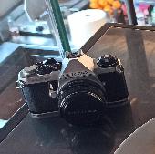 Hi, I lost my analog Pentax camera in Milan. Inside there's a film with me and m