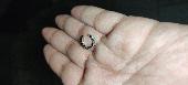 Small silver round jewellery attachment, perhaps from a necklace or earing