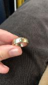 Found what looks like a white gold wedding / engagement band with a small diamon