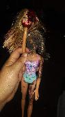My Zombie Barbie doll with a Barbie head on the right hand. The last time I seen