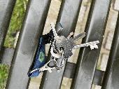Keys found on grass in cricket pitch area. Left on Charles McMillan bench, on th