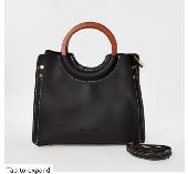 My bag was taken whilst I was sightseeing at Big Ben, it was a black Laura Ashle