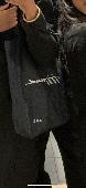 Lost denim apc tote bag with my AirPods, wallet, and charger 