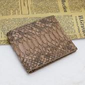 Lost wallet in Peckham Rye Park around 5pm. It is an old snakeskin wallet (senti