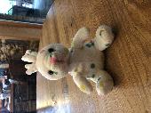 Found white stuffed bunny with yellow, green and pink polka dots on the Jeff Bar