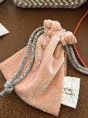 Pink pouch labelled chambers & beau containing lots of silver jewellery - lost a