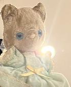 Lost 40+ year old Teddy bear. Pink cat, blue eyes, blue dress. Very well loved (