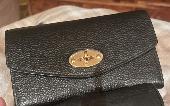 Black Mulberry purse with gold clasp plus contents. 