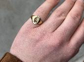 Small 18k gold ring lost today. Crest engraving. 