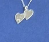 2 Heart shaped lockets with husband and son’s fingerprints 
