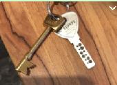 I lost a small chequered black & white purse with a zip and house keys inside it